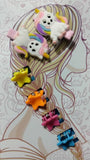 Broches de colores con mariposas o unicornios